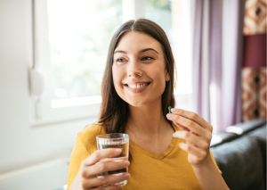 lady taking a nootropics cognipure to enhance their productivity